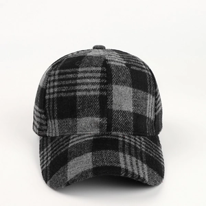Deep grey plaid wool baseball cap with a classic six-panel design and curved brim