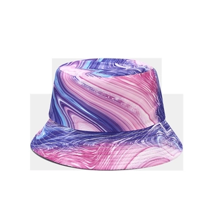 Close-up of colorful marble graffiti print bucket hat with pink and blue swirls