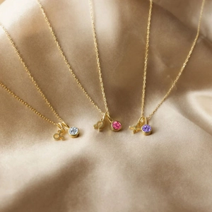 Three-piece gold plated 18K stainless steel necklaces with birthstones and zodiac charms