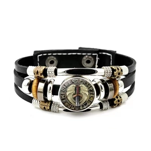 Handcrafted Nordic Viking leather bracelet featuring a winged sword charm and runes