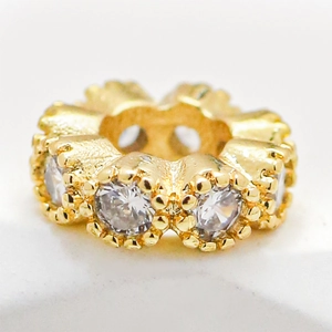 Elegant 18k gold plated copper ring with 6mm clear cubic zirconia stones in macro view