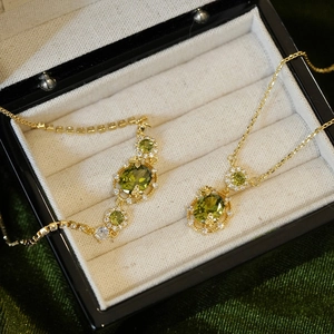 Elegant 18K gold plated necklace and bracelet set with green oval zircon stones