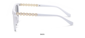 Detail of white square sunglasses with gold metal temples and elegant pearl inlay accents