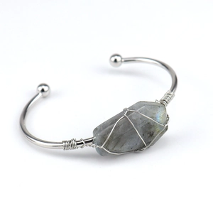 Handmade silver wire-wrapped cuff bracelet with natural raw gray labradorite crystal stone