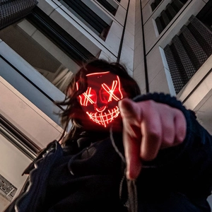 Dynamic low angle shot of red LED light-up mask for Halloween party and cosplay