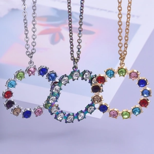 18k gold plated stainless steel necklaces with circular hollow pendants and colorful zircons