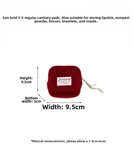 Detail of red plush coin purse showing 9.5x9.5x5cm size with zipper and soft texture