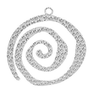 Macro shot of silver spiral metal pendant with hammered texture and circular ring loop