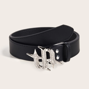 Black leather belt with vintage rhinestone metal buckle in a minimalist studio shot