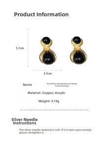 Detail view of vintage gold textured hoops with black teardrop pendants and dimensions