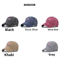 Detail view of five washed cotton baseball caps with flamingo embroidery in various colors