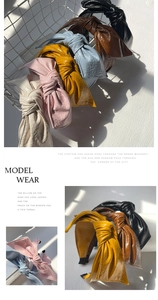 Macro detail of assorted vintage PU leather bow headbands in six stylish colors