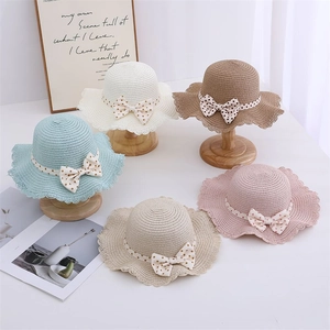 Girls summer straw sun hat with wavy lace trim and polka dot bow in five colors
