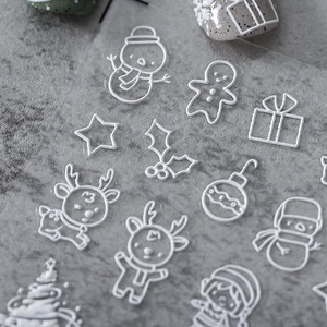 3D Christmas embossed nail stickers featuring white snowman and reindeer on gray stone