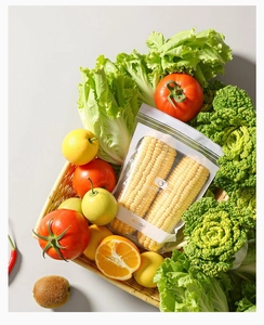 Detail of a thick food-grade airtight bag holding fresh corn in a kitchen scene