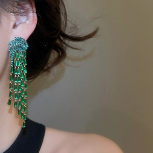 Elegant emerald green zircon flower tassel drop earrings for a sophisticated look