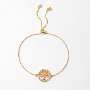 Detail of tree of life charm with cubic zirconia and adjustable box chain in gold