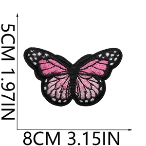Macro detail of butterfly embroidery patch showing 8cm x 5cm size measurements