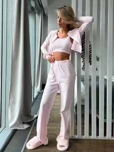 Three-piece pink loungewear set with cardigan, camisole top, and waffle knit pants