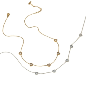 Elegant stainless steel heart pendant necklace with rhinestones in gold and silver finish
