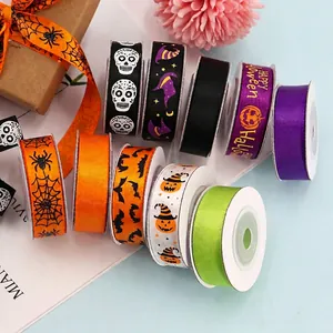 Halloween ribbon set with pumpkin and bat patterns for festive gift wrapping and DIY bows