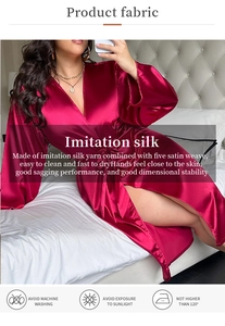 Detail of red imitation silk bathrobe showing glossy satin weave and soft fabric texture