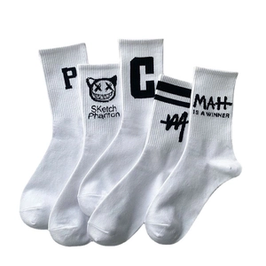 Five styles of white cotton athletic crew socks with black graphic patterns and typography