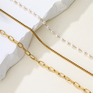 Three-layer 18K gold plated stainless steel necklace featuring elegant white pearls