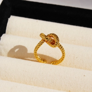Vintage style gold-plated twisted rope knot ring with adjustable open band design