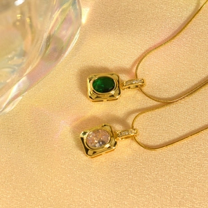 Square emerald and clear zircon pendant necklaces in gold plating with snake chain detail