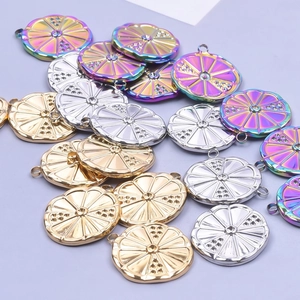 Polished stainless steel lemon slice pendants in gold, silver, and rainbow colors