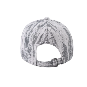 Detail view of the adjustable metal buckle and marble pattern on the plaid baseball cap