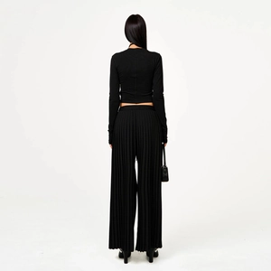 Women's black long sleeve crop top and high waist pleated wide leg pants outfit set