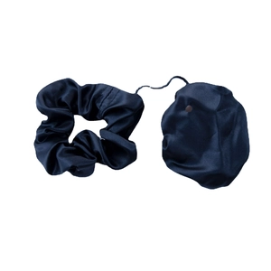 Dark blue satin scrunchie and anti-spiking elastic drink cover set on white background