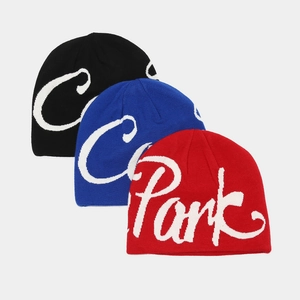 Detailed knit texture and letter jacquard patterns on multi-color winter beanies