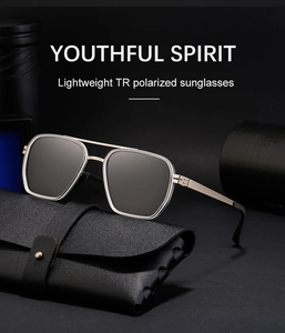Close-up of lightweight TR polarized sunglasses with silver metal frame on leather case