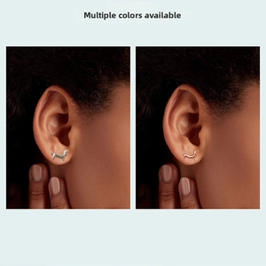 Close-up of cute dachshund shaped S925 silver stud earrings in silver and rose gold finishes