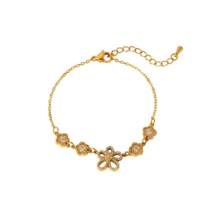 Detail view of 18K gold flower bracelet with clear zircons and adjustable lobster clasp