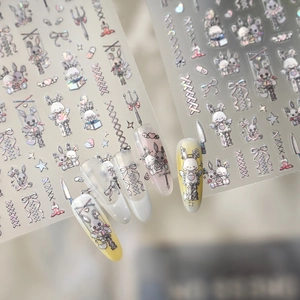 Gothic nail stickers featuring laser rabbits, bows, and crosses with holographic finish