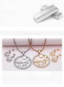 Detail of 18K gold plated stainless steel bird and moon jewelry set with sparkling crystals
