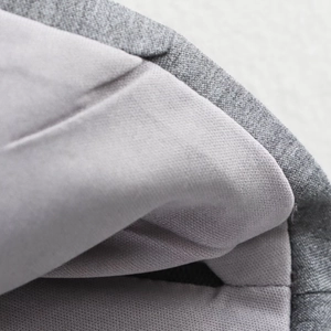Haut ajusté bicolore gris pour femme avec nœud et ourlet péplum en vue rapprochée