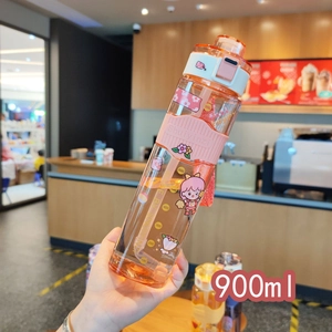 Detail of 900ml square plastic water bottle with straw, carry strap and cartoon stickers