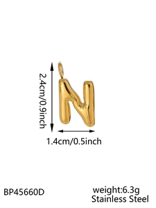 Detailed view of golden stainless steel puffy letter N pendant with size measurements