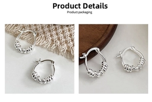 Detail view of twisted silver hoop earrings with a textured metal weave finish