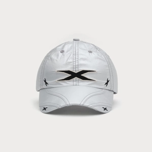 Detailed view of silver grey baseball cap with high-quality black cross embroidery