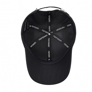 Classic black baseball cap with interior brand tape and adjustable metal buckle
