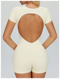 Detail of woman's back view showing the cutout design on a cream sports bodysuit