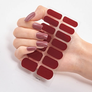 Macro view of dark red 3D laser nail stickers with model DQ-04 and 16 pieces
