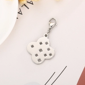 Silver stainless steel clover pendant with hollow patterns and lobster clasp closure