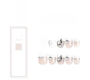 Detail of short French white press-on nails with silver lines and heart crystal accents